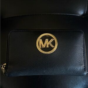 Michael Kors Black Leather Accessory with Gold Emblem